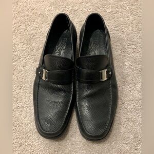 Men’s black Ferragamo moccasin with ornament. Size 9.5. Good used condition.